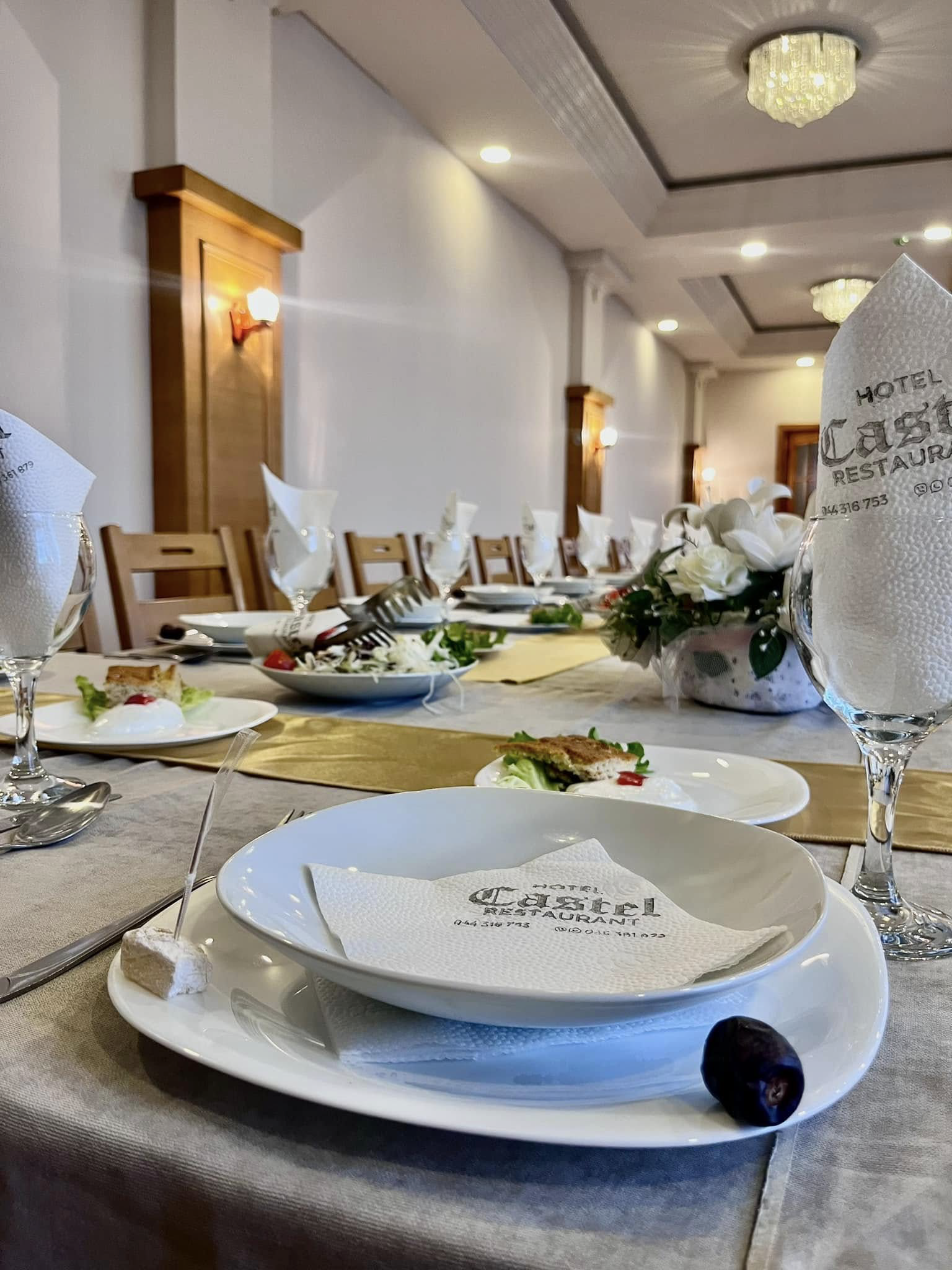 Buffet and interior at Castel Restaurant